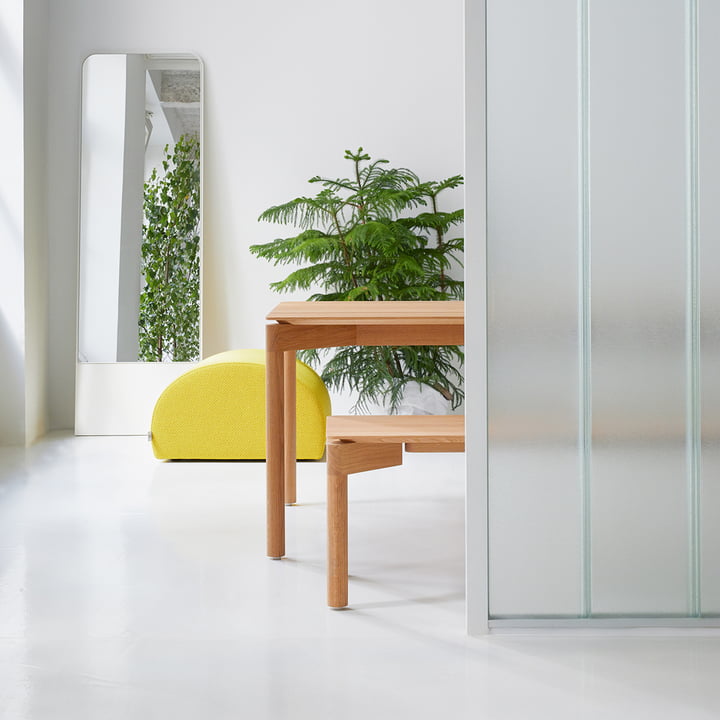 The Wedekind table and the Wedekind Bank of OUT Objekte unserer Tage with plants behind a glass wall