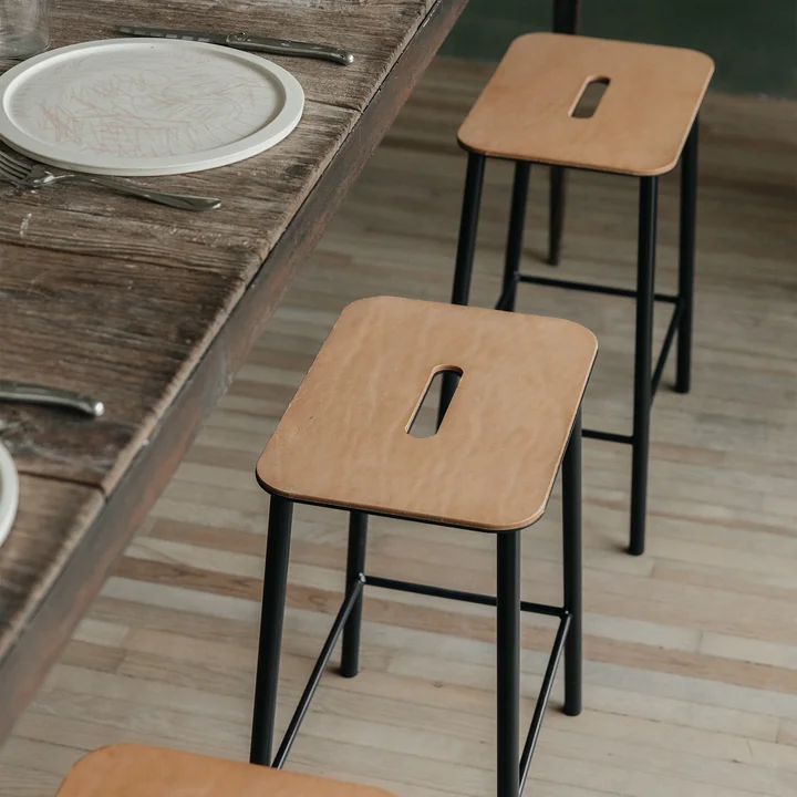 The stools from Frama at the dining table