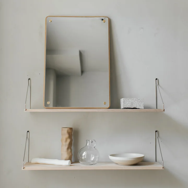 Minimalist wooden shelves from Frama