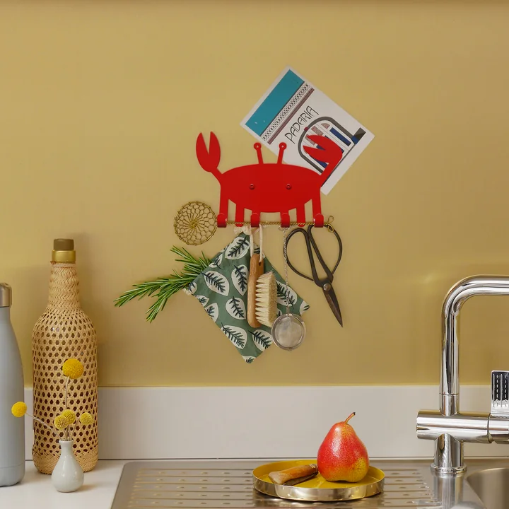 The little crab wall hook from vonbox above the sink in the kitchen