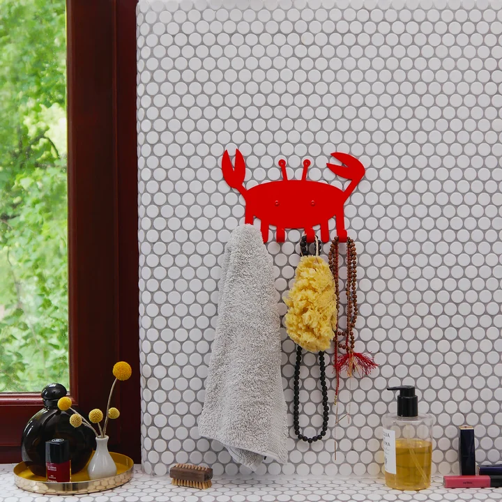 The little crab wall hook from vonbox on the wall in the bathroom
