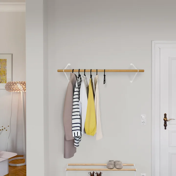 The Lilli wall coat rack from vonbox in the hallway above a shoe rack