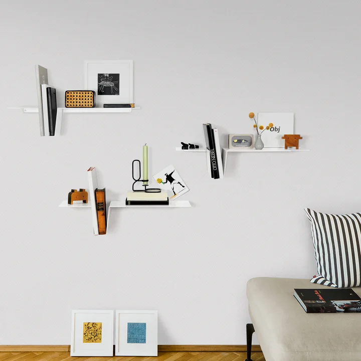 The DOV wall shelf from vonbox in combination above a light couch in the living room