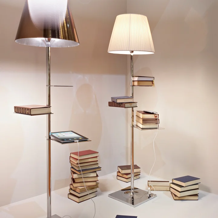 The Bibliotheque Nationale floor lamp from Flos with many books on its shelves
