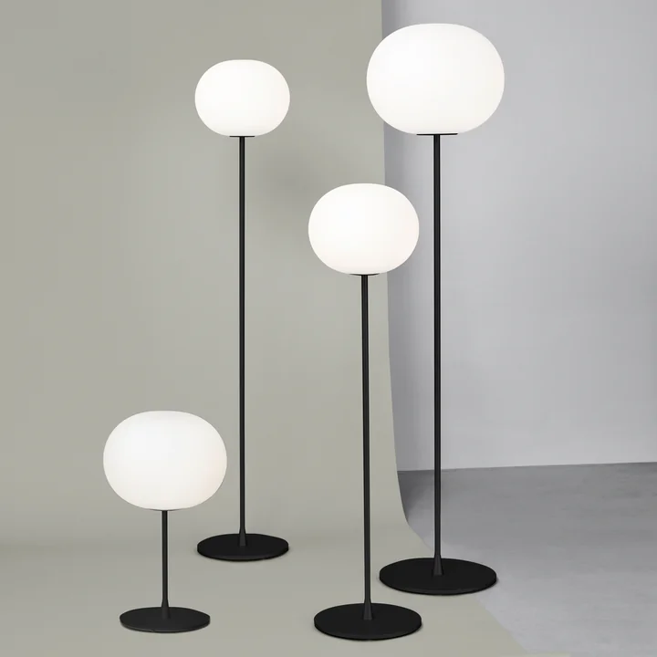 The Glo Ball floor lamps and table lamp from Flos in black matt