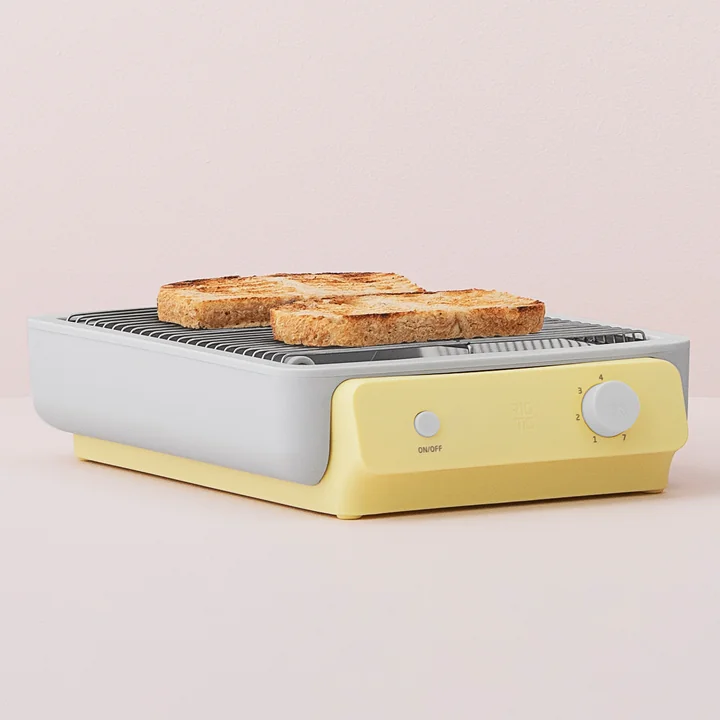 The Foodie flat toaster from Rig-Tig by Stelton in light yellow is a particularly attractive eye-catcher.