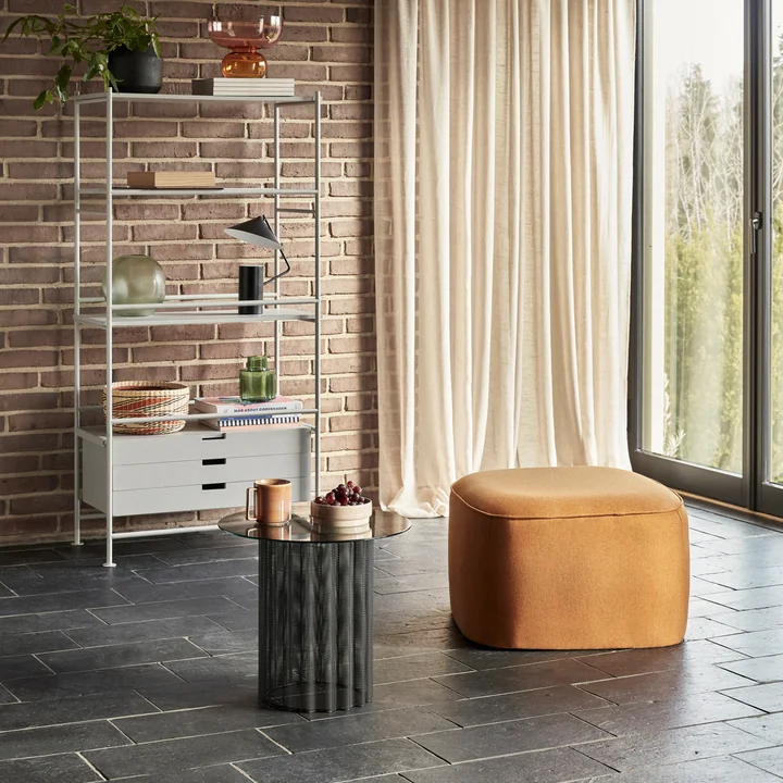 The metal table lamp from Hübsch Interior in a spacious wall shelf