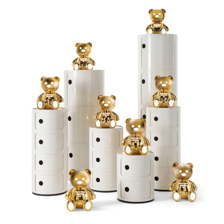 Toy Moschino Teddy bear table lamp on the matching decorative cardboard