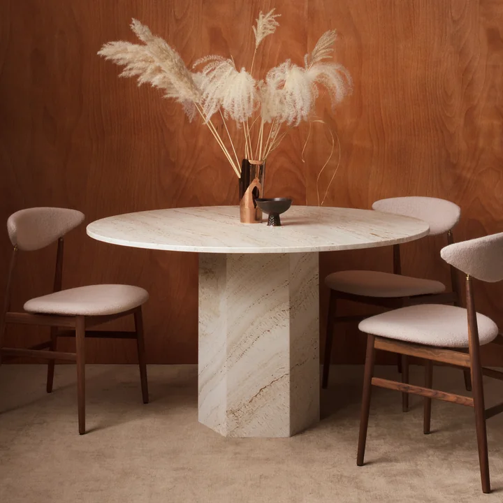 Stylish stone dining table in classic ambience