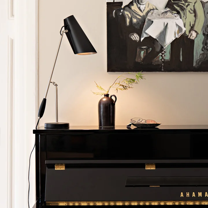 The Birdy Table lamp from Northern on a black piano
