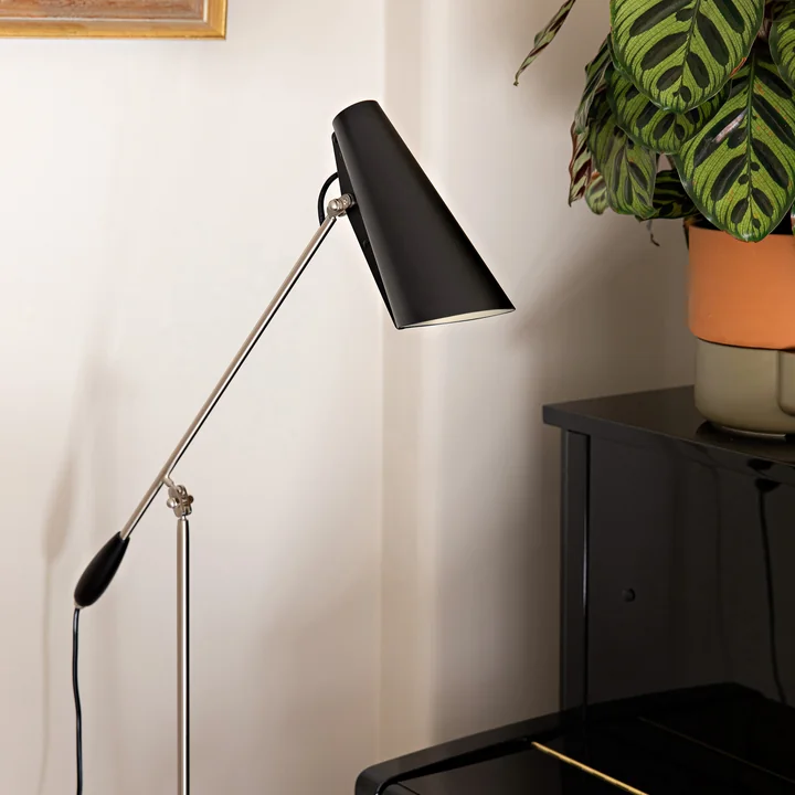 The black Birdy Floor lamp from Northern above the piano