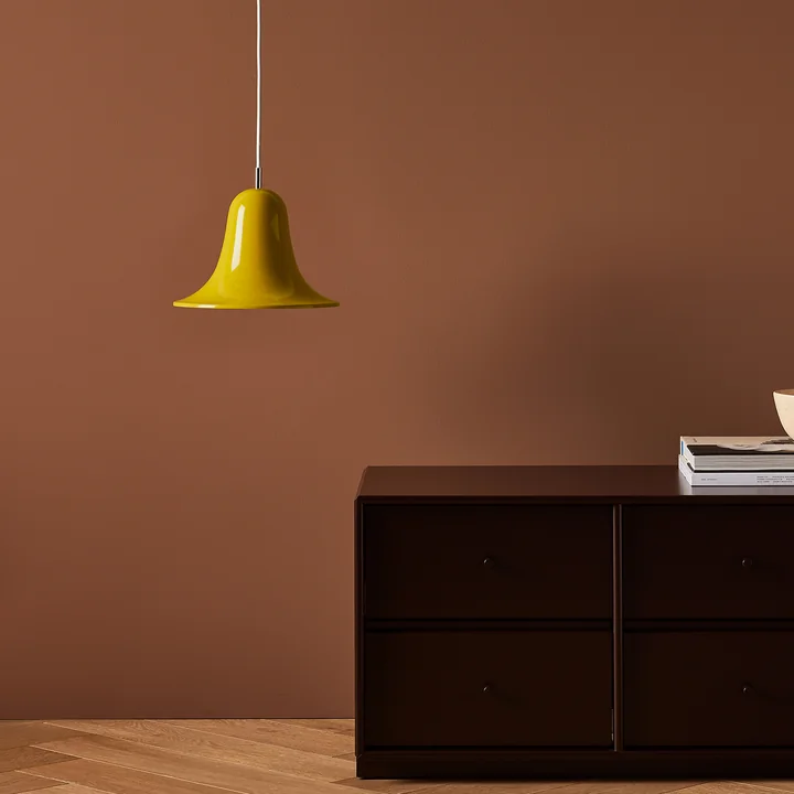 Yellow Pantop pendant lamp from Verpan serves as room and functional lighting