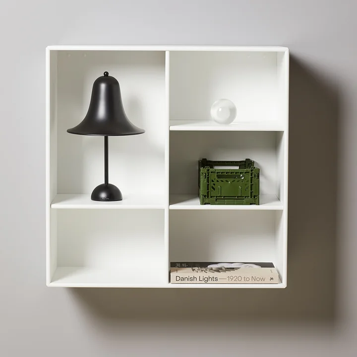 The black matte Pantop table lamp from Verpan in a bookcase