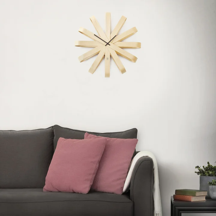 Stylish clock made of wood in every ambience