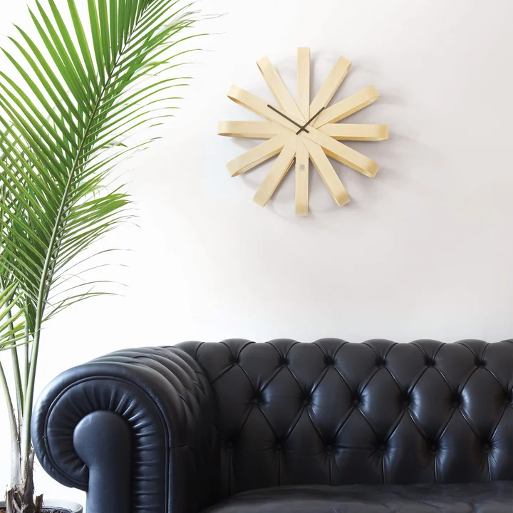 Stylish wooden clock not only in the living room