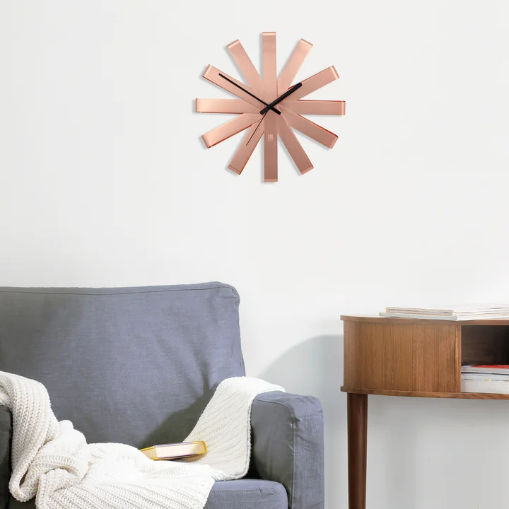 The Ribbon copper wall clock in the living room