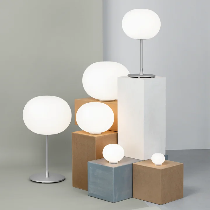 The different Glo-Ball lights from Flos in silver matt in combination