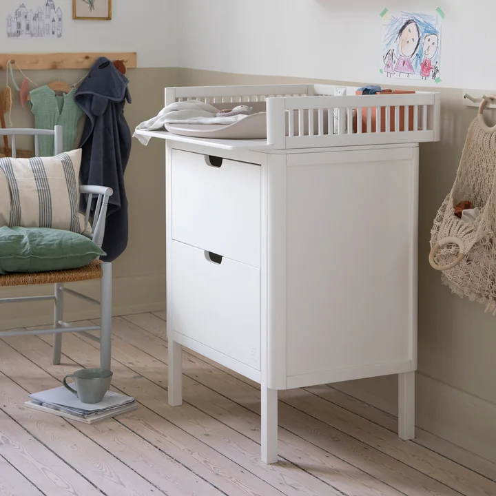 The Pusle Pure changing mat on the white changing unit from Sebra