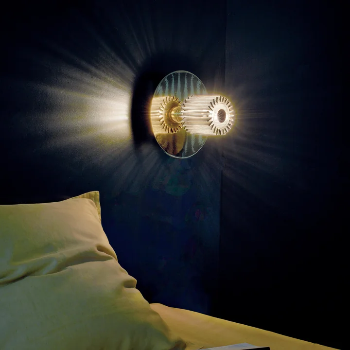 The In the Sun wall lamp from DCW on the wall above the bed