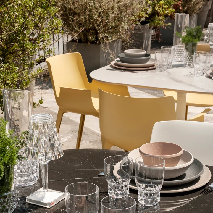 Battery Table lamp, Trama tableware and Piuma chair from Kartell
