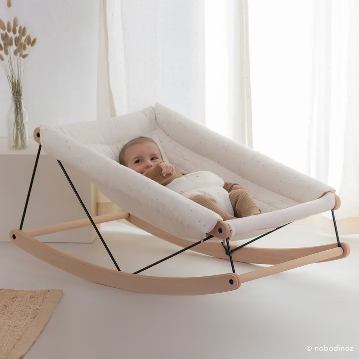 Growing Green Baby bouncer with cushion from Nobodinoz in honey sweet dots natural
