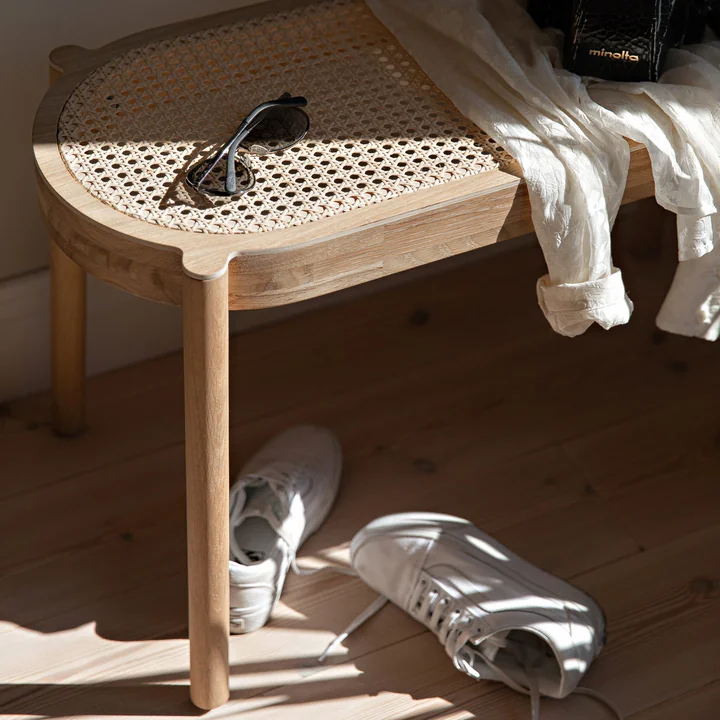 Slim wooden bench with comfortable seat