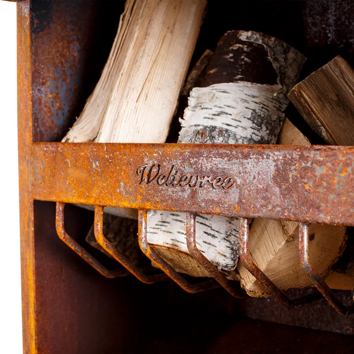 The wood basket of the Outdoor steel stove XL from Weltevree