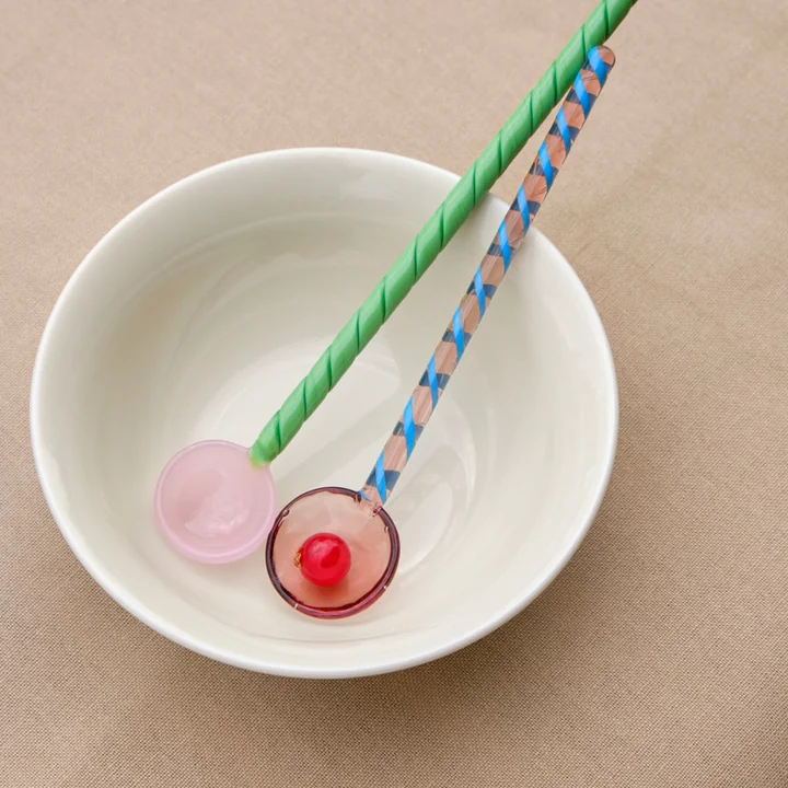 The glass spoons with earthenware dishes