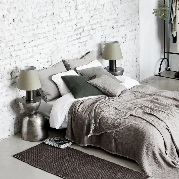 The Chindi carpet from House Doctor next to the bed