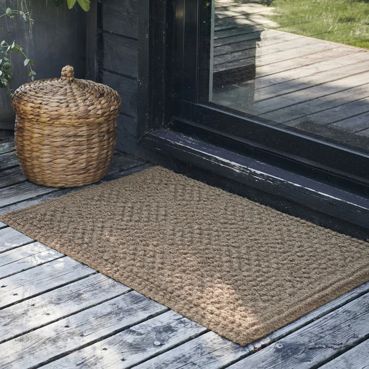 The Clean doormat from House Doctor in front of the patio door