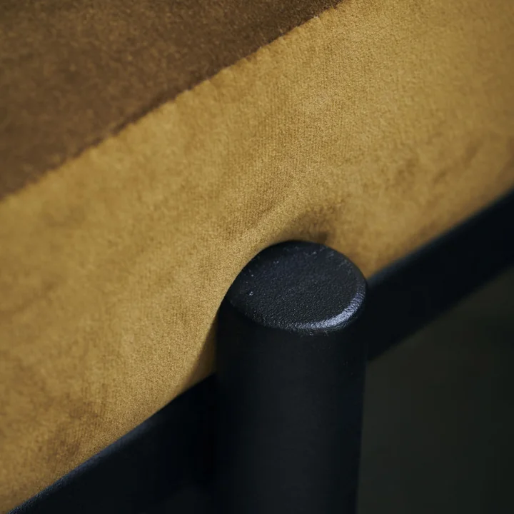 The Lao bench from House Doctor with its velvet cover and steel frame.