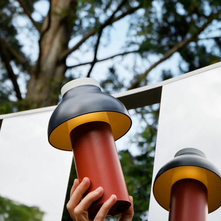 Portable design light with rechargeable battery