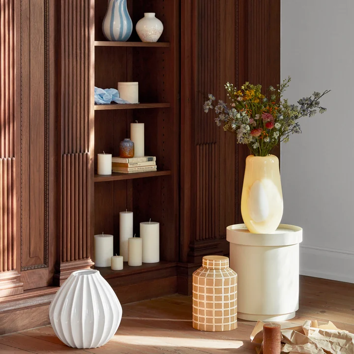 The yellow Ada Dot vase with a wild bouquet of flowers