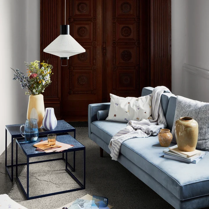 The Ada vases from Broste Copenhagen on a modern side table in the living room