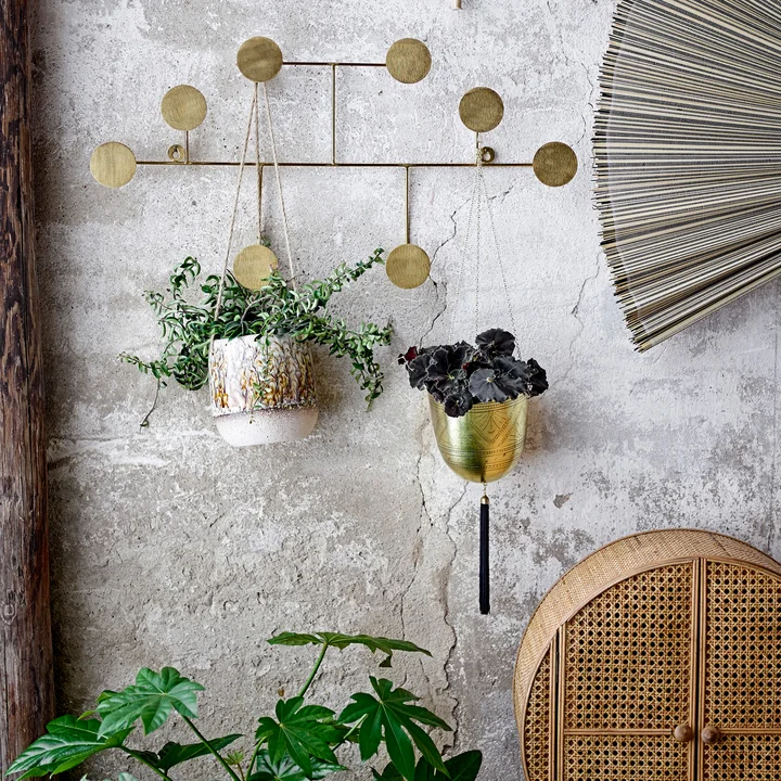 The Fia wall coat rack from Bloomingville with hanging plant pots