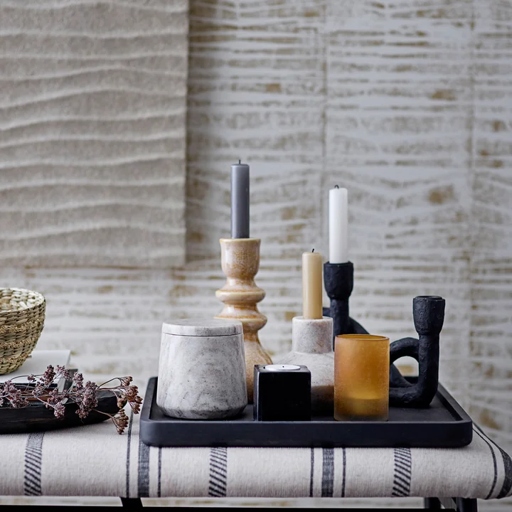 The Mashel candleholder from Bloomingville on the coffee table next to other candleholders