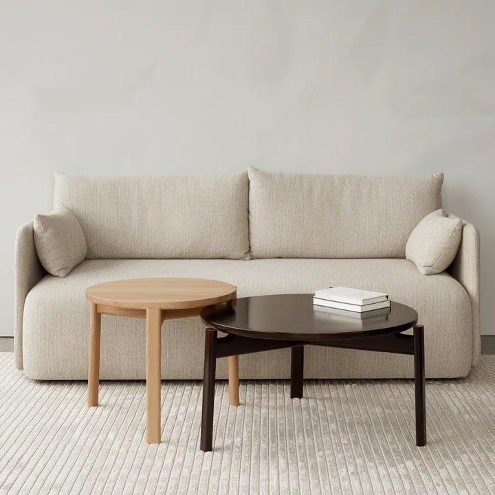 The Passage Lounge tables from Audo in different lacquers in front of the sofa
