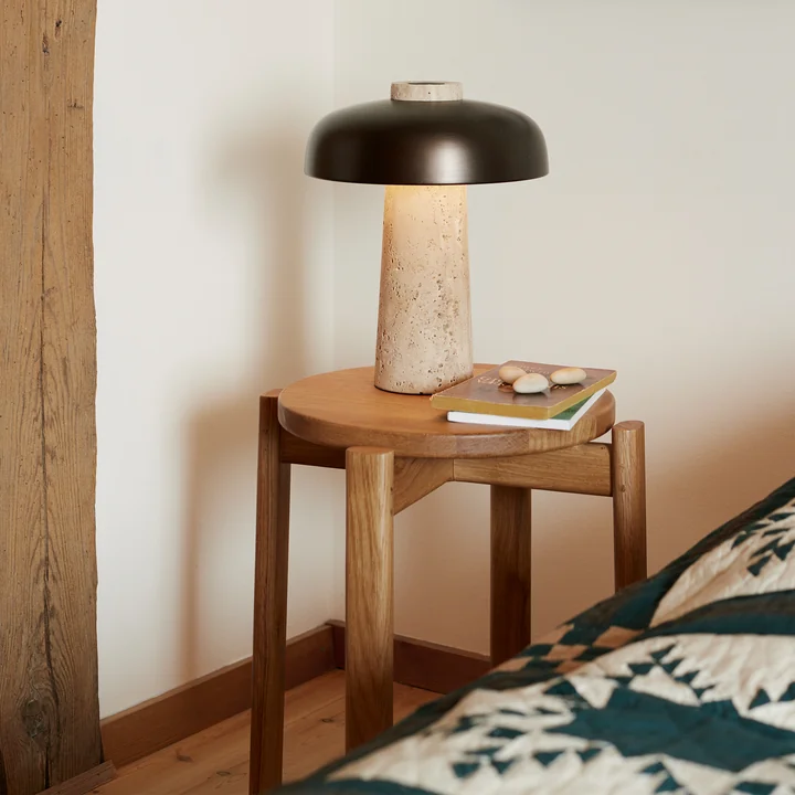 The Passage stool from Audo as a bedside table with light