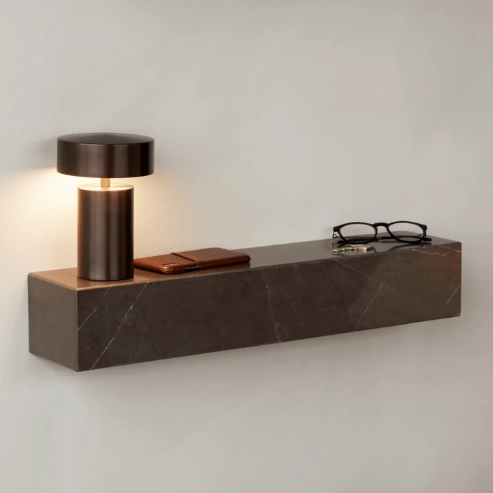 The Plinth shelf from Audo as a noble storage for everyday objects