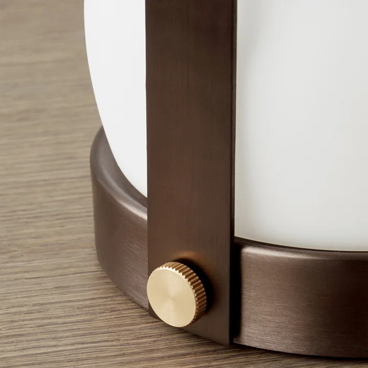 Portable lamp with brass finish