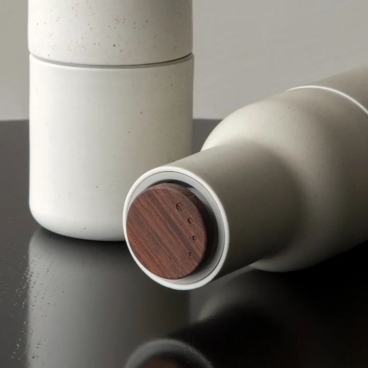 Stylish spice mills with wooden lids