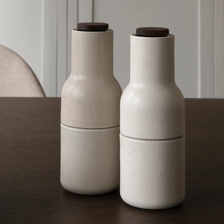 Decorative spice mills on the dining table