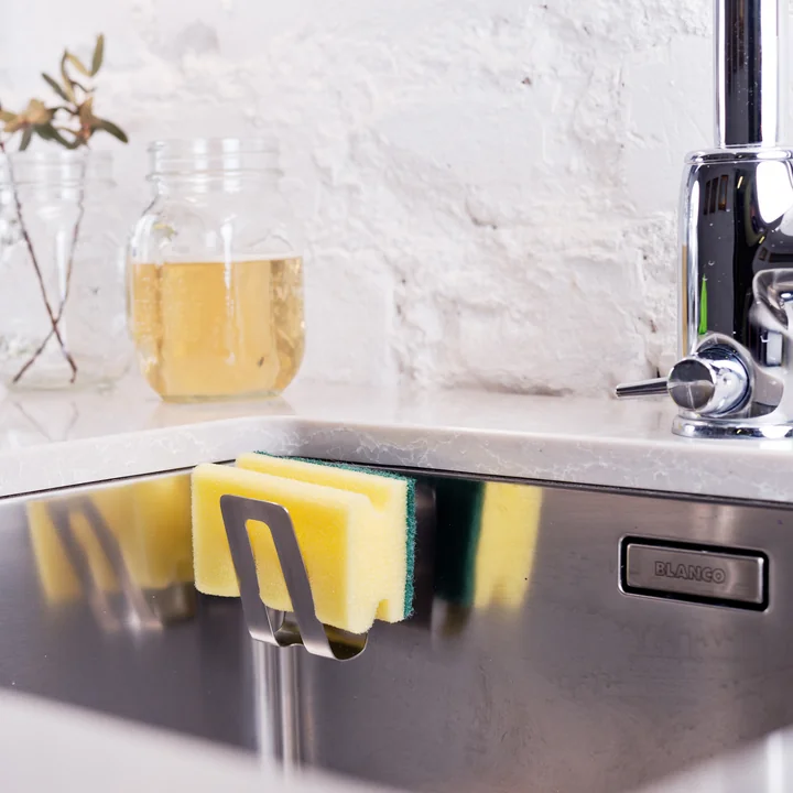 The magnetic sponge holder from Happy Sinks is a hygienic solution for the sink