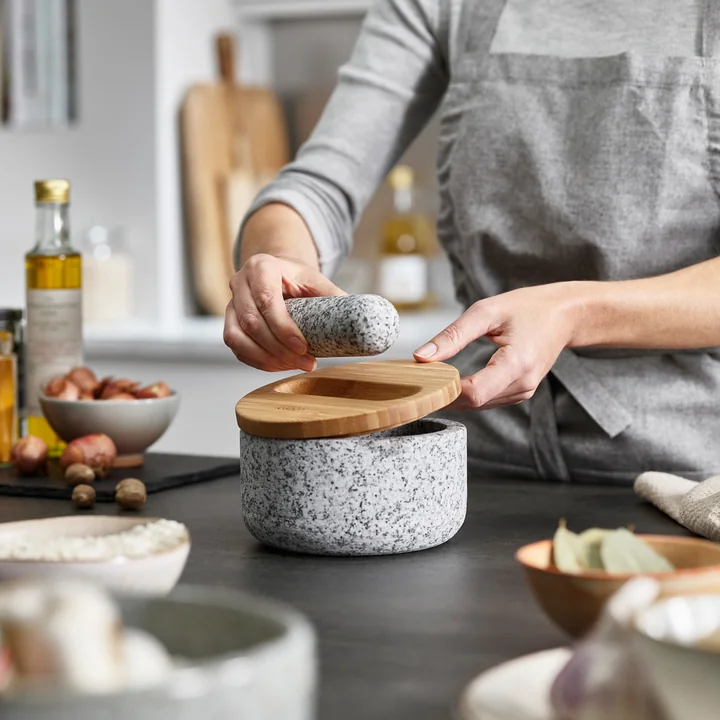 The Dash mortar and pestle from Joseph Joseph in use in the kitchen