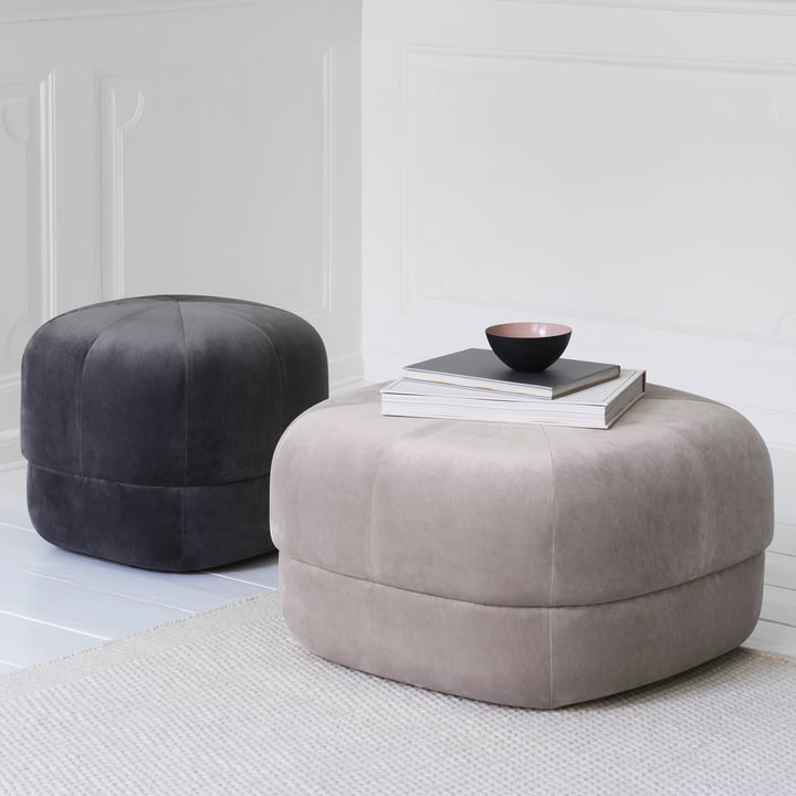 The Circus pouf from Normann Copenhagen as a shelf for books