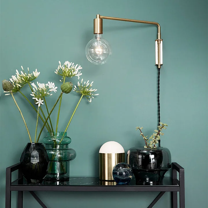 Brass wall lamp from Hübsch Interior
