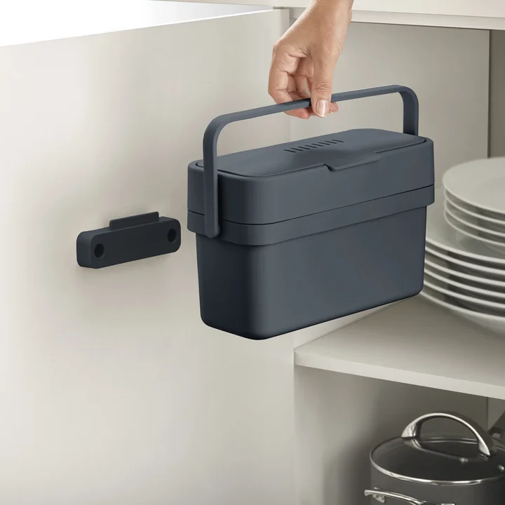 The Compo 4 organic waste bin from Joseph Joseph can be attached to the inside wall of the cupboard
