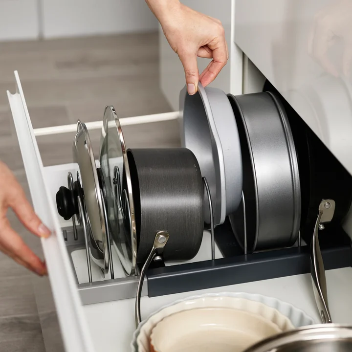 Lids, pots and baking dishes fit in the DrawerStore cookware organizer from Joseph Joseph