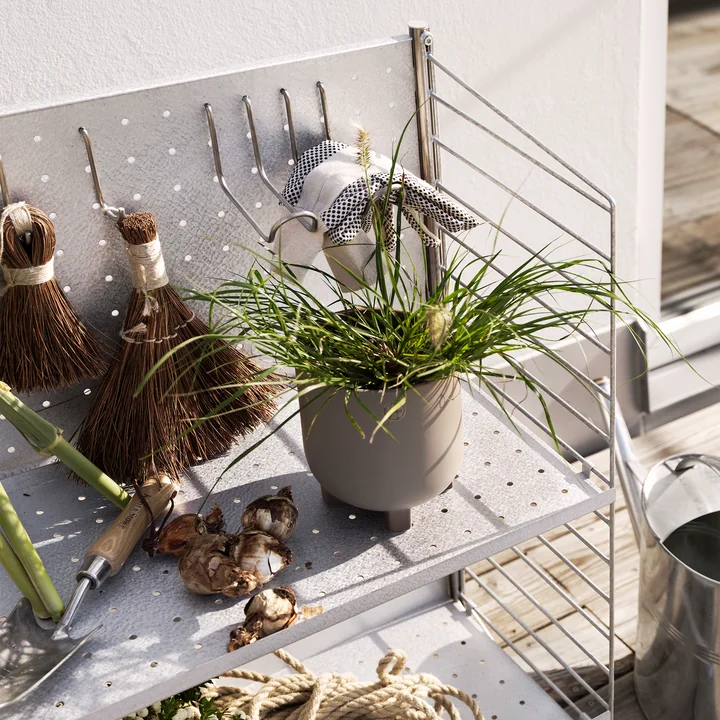 Outdoor shelf with hanging hooks