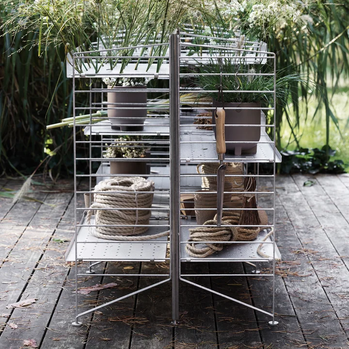 Freestanding shelf for garden tools and flowers